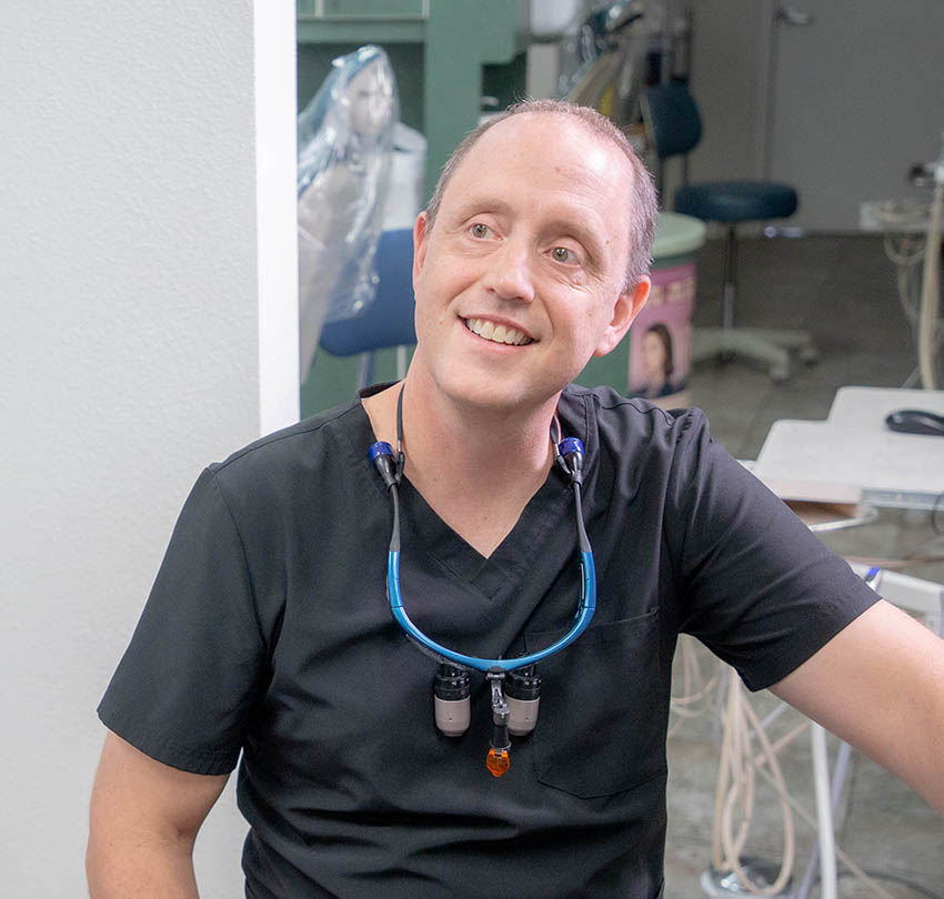 A Premier dentist listening during a care conversation
